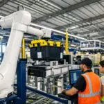 Robots Amazon Robotics operando en centro logístico en Barcelona, innovación tecnológica y empleo