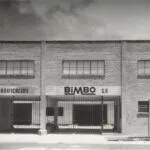 Evolución de Grupo Bimbo desde sus primeras panaderías en México hasta sus plantas industriales modernas en 2026