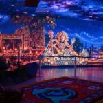 Altar de Día de Muertos con flores de cempasúchil y elementos tradicionales en un espacio inspirado en el Aquarium de Veracruz.